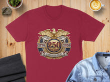 Load image into Gallery viewer, Maroon t-shirt with 1776-2026 Anniversary eagle emblem.
