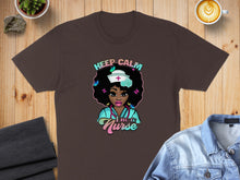 Load image into Gallery viewer, Brown t-shirt with cartoon nurse graphic and "Keep Calm I'm a Nurse" text.

