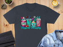 Load image into Gallery viewer, Dark gray t-shirt featuring "PT Physical Therapy" with coffee cups and medical icons.
