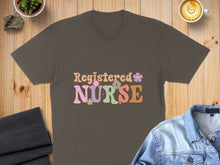 Load image into Gallery viewer, Brown t-shirt with "Registered Nurse" text in colorful retro font.
