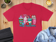 Load image into Gallery viewer, Pink t-shirt with cartoon nurse practitioner theme including coffee cups and medical items.
