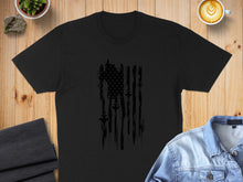 Load image into Gallery viewer, Black t-shirt with distressed American flag design.
