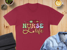 Load image into Gallery viewer, Maroon t-shirt with "Nurse Life" text and syringe graphic.
