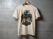 Load image into Gallery viewer, T-shirt with "AMATEUR EXTRA" text and radio operator graphic featuring globe and antennas.
